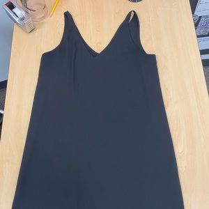 Nice, loose day dress, no flaws, just too big for me. Great work dress